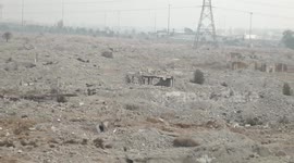 Syria: Damascus residents return to shattered neighborhood to find home