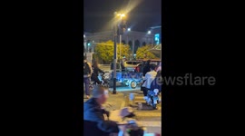 China: Old Tricycle Driver Dance with the Music
