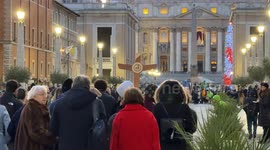 Pilgrims set off towards St. Peter's Basilica along Via della Conciliazione carrying the official Jubilee 2025 Cross, the central symbol of the pilgrimage, given to each pilgrim group leader to accompany them as they pass through the Holy Door of St. Pete