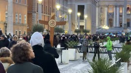 Pilgrims set off towards St. Peter's Basilica along Via della Conciliazione carrying the official Jubilee 2025 Cross, the central symbol of the pilgrimage, given to each pilgrim group leader to accompany them as they pass through the Holy Door of St. Pete