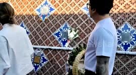 Volunteers clean graves of Boxing Day Tsunami victims on 20th anniversary of disaster