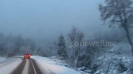 Drivers battle through snow in Cottonwood Canyons
