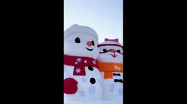 Giant snowmen welcome tourists in NE China's Heilongjiang