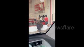 China: Giving Orange to a Poor Mother and Her Daughter