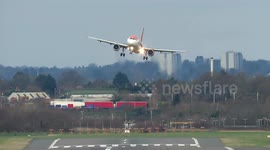 Terrifying moment planes are rocked as they try to land in extreme 45mph New Years Eve Storm crosswinds at Birmingham Airport