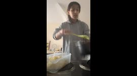 Plastic container melts on hot burner, causing food to spill