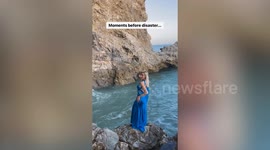 Model gets dragged underwater by huge wave in the middle of a photoshoot