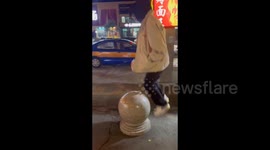 China: Unique Balance on the Stone Bollard