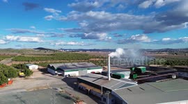 Factory emites smoke pollution contamination on a windy day in Spain