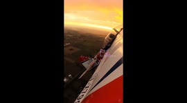 Aerobatic Plane Covered In Christmas Lights