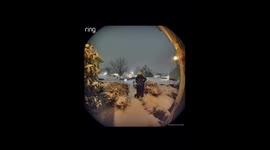 Exclusive- Snow shoveling gone wrong- girl goes flying into bush in front of her house while shoveling snow