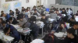 Brave schoolboy carries disabled classmate on his back during earthquake