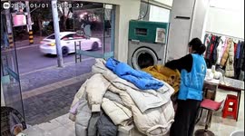 Stray firework flies into dry-cleaning shop burning clothes and startling staff