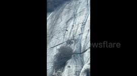 Watch this goat effortlessly glide across steep cliff face 1,600 metres high