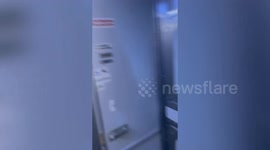 Man recreates scene from The Wedding Singer scene and proposes mid-flight