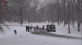 Major Snow Storm Hits Midwest As Children Take Advantage Of The Snow By Sledding