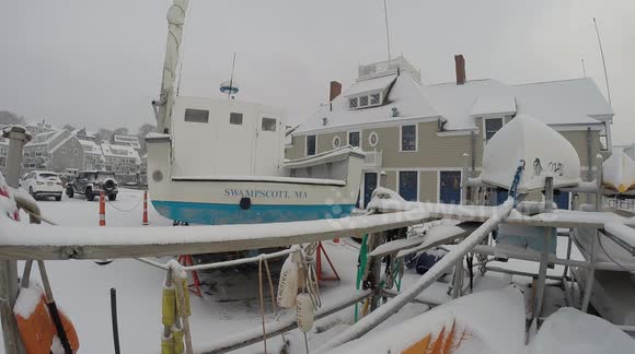 Snowstorm predicted to miss instead buries Boston and New England as temperatures drop