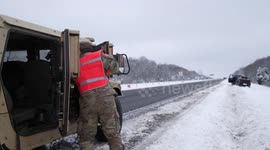 Arkansas National Guard clears snow-covered roads