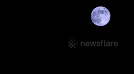 The January Moon known as the Wolf Moon was spotted through the night with Mars close by