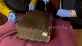 Annual book cleaning at The Chained Library in Hereford Cathedral