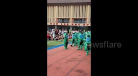 China: The Child in the Frog Costume Who Persisted in Performing