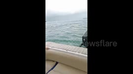 Boaters Rescue Boy Floating In Inflatable Plastic Bubble