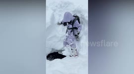 Woman's snowboard stops just short of her plunging into underground river