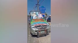 Police cover naked models used in food van's advertising posters and arrest owner