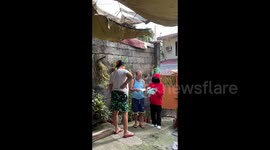 Daughter who works overseas makes surprise return home dressed as deliveryman