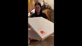 Woman overcome with emotion after opening surprise gift from Beauty and the Beast's Paige O'Hara