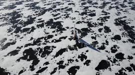 US: Iceboat sailors glide across frozen surface of Quaboag Pond in Massachusetts