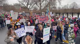 Anti-Trump demonstrators march in Washington, DC ahead of Trump inaugural