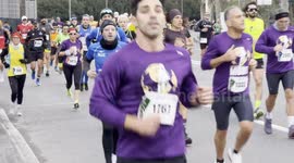 Men and women running during the Miguel's Race organized by the Club Atletico Centrale in Rome.