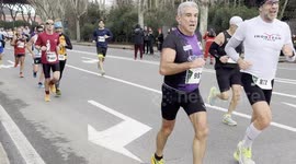 Men and women running during the Miguel's Race organized by the Club Atletico Centrale in Rome.