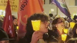 Demonstrators during the torchlight procession of protest against the approval of the Security Decree, the DDL 1660 on public safety, in Rome.