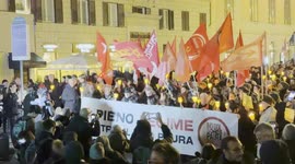 Demonstrators during the torchlight procession of protest against the approval of the Security Decree, the DDL 1660 on public safety, in Rome.