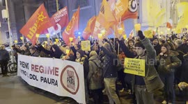 Demonstrators during the torchlight procession of protest against the approval of the Security Decree, the DDL 1660 on public safety, in Rome.