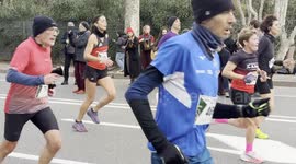 A folk music group plays to welcome the arrival of the participants in the Miguel’s Race organized by the Club Atletico Centrale in Rome.