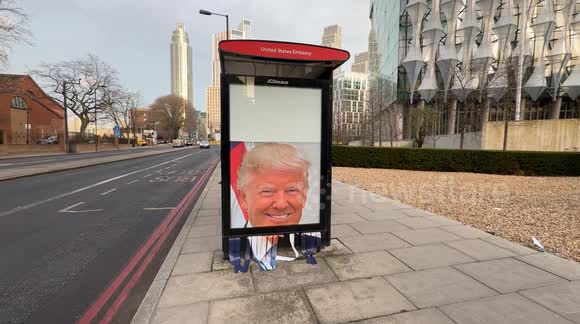 Shredded Trump sign outside US Embassy in London