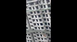 Safety nets save worker who plunged from 13th floor of building