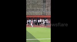 China: Dragged to the Finish Line in the 800-Meter Run