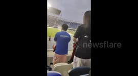 China: A video of a football match filmed from the stands