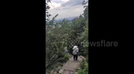 US: Overlooking the City from the Mountain Top