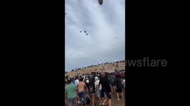 Argentina: Cumbia singer throws money from helicopter and lands on beach: Pilot's license was revoked