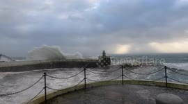 Waves from Storm Eowyn hitting the harbour mouth a Laxey on the Isle of Man.