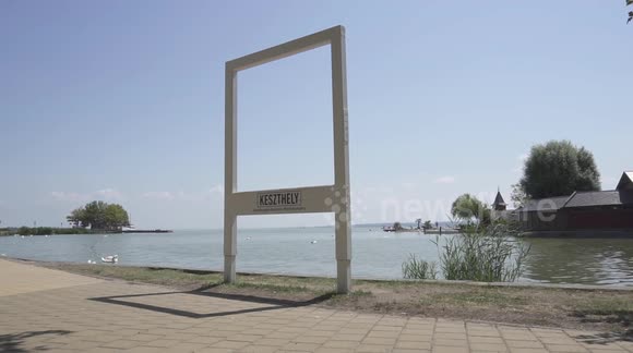 Beautiful view of Lake Balaton during daytime in summer! Keszthely Beach with frame for photos.