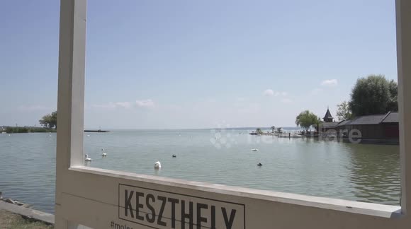 Beautiful view of Lake Balaton during daytime in summer! Keszthely Beach with frame for photos.