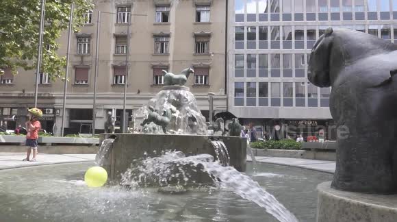 Atmospheric little fountain with a yellow air balloon in the beautiful city of Ljubljana