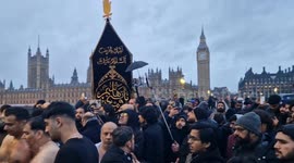 Islamic profession with self flagulation takes place at Westminster Bridge