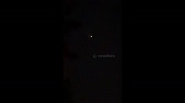 What I thought was a really bright star turns out to be an orange dancing orb 50,000 feet In the midnight sky